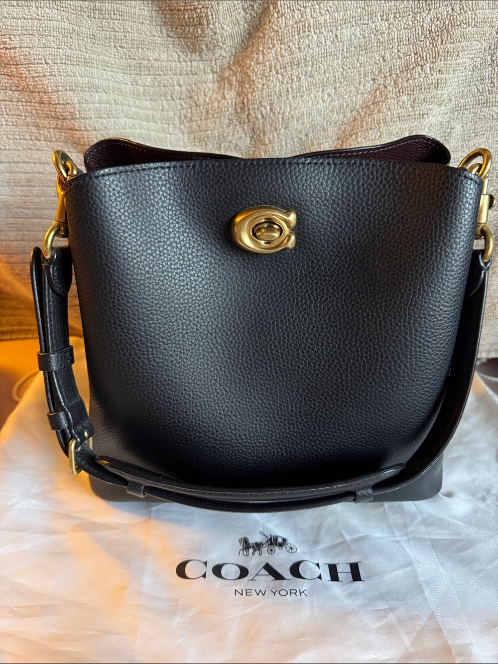 Small Coach Black Pebbled Leather Shoulder Bag with Gold Turn-Lock